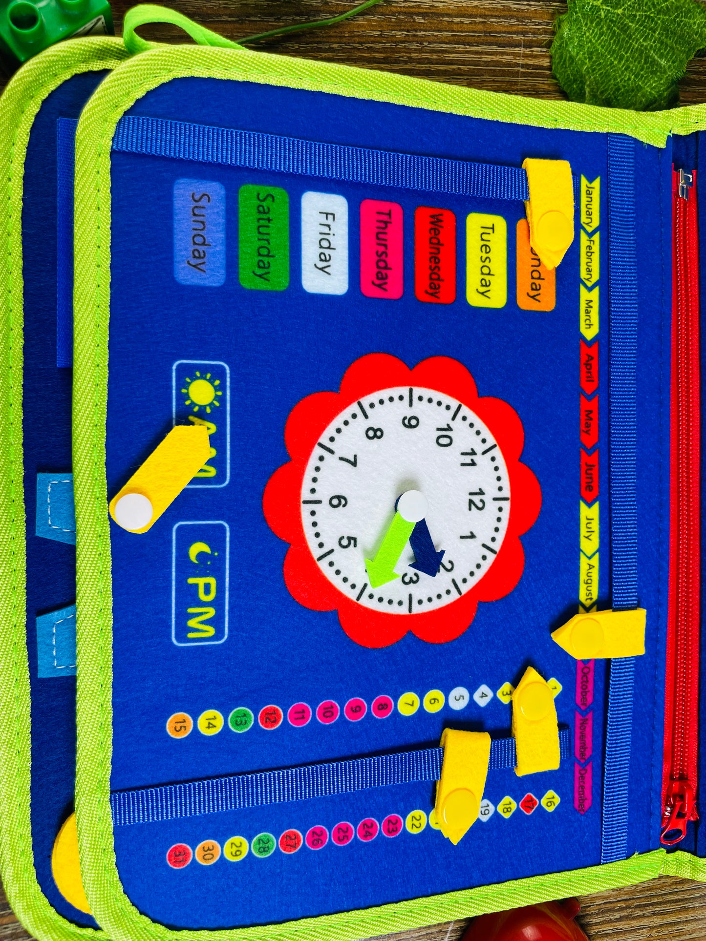 Children's educational book with a clock and days of the week illustration 